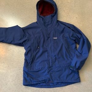Patagonia men’s Small Fleece lined shell jacket with hood